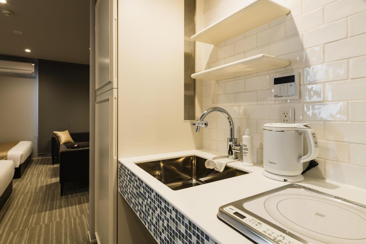 Aparthotel Grand Base Yakuin Odori Fukuoka  Esterno foto