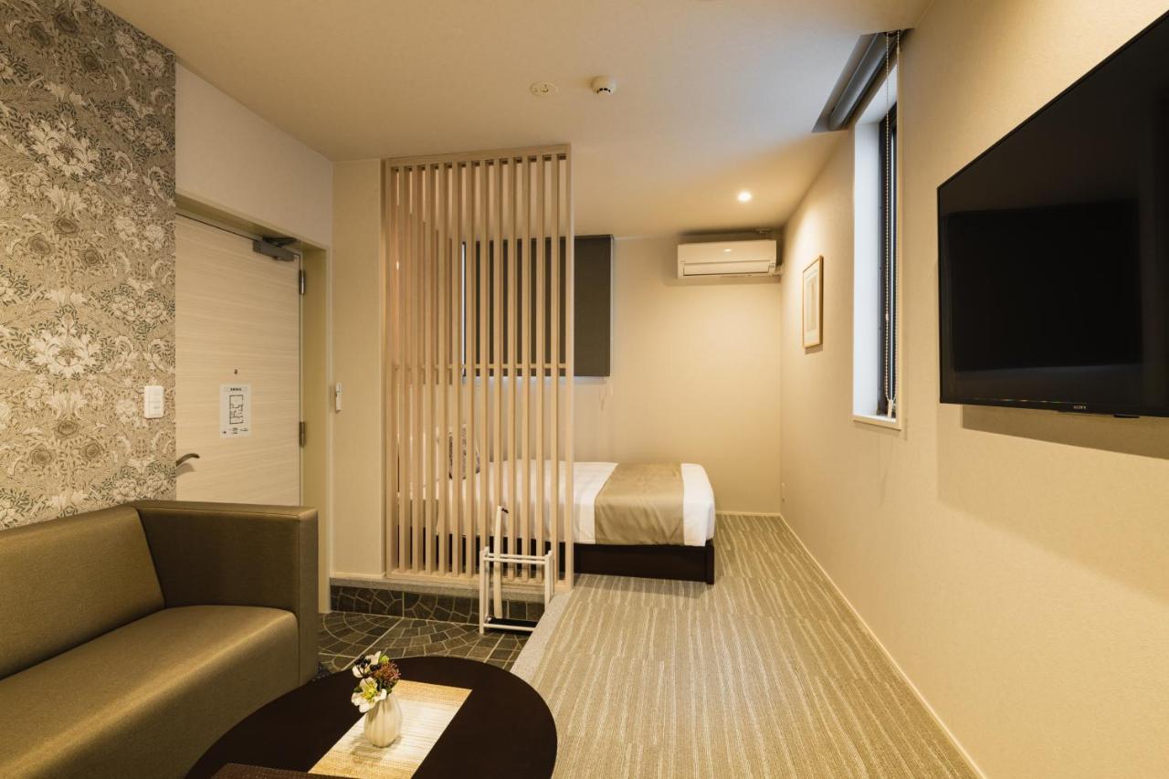 Aparthotel Grand Base Yakuin Odori Fukuoka  Esterno foto